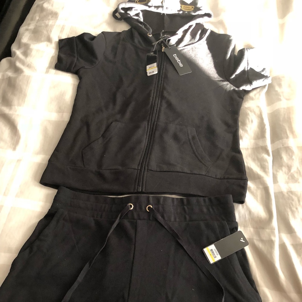 Women Bebe clothing with zip hoody medium